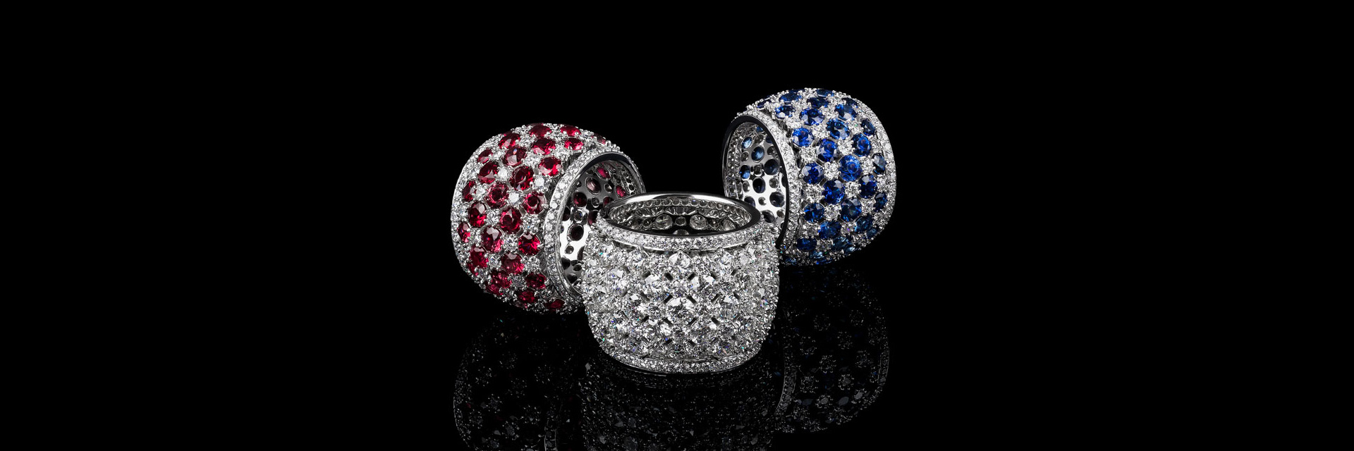 Two gemstone rings and one diamond ring Picture of three diamond rings